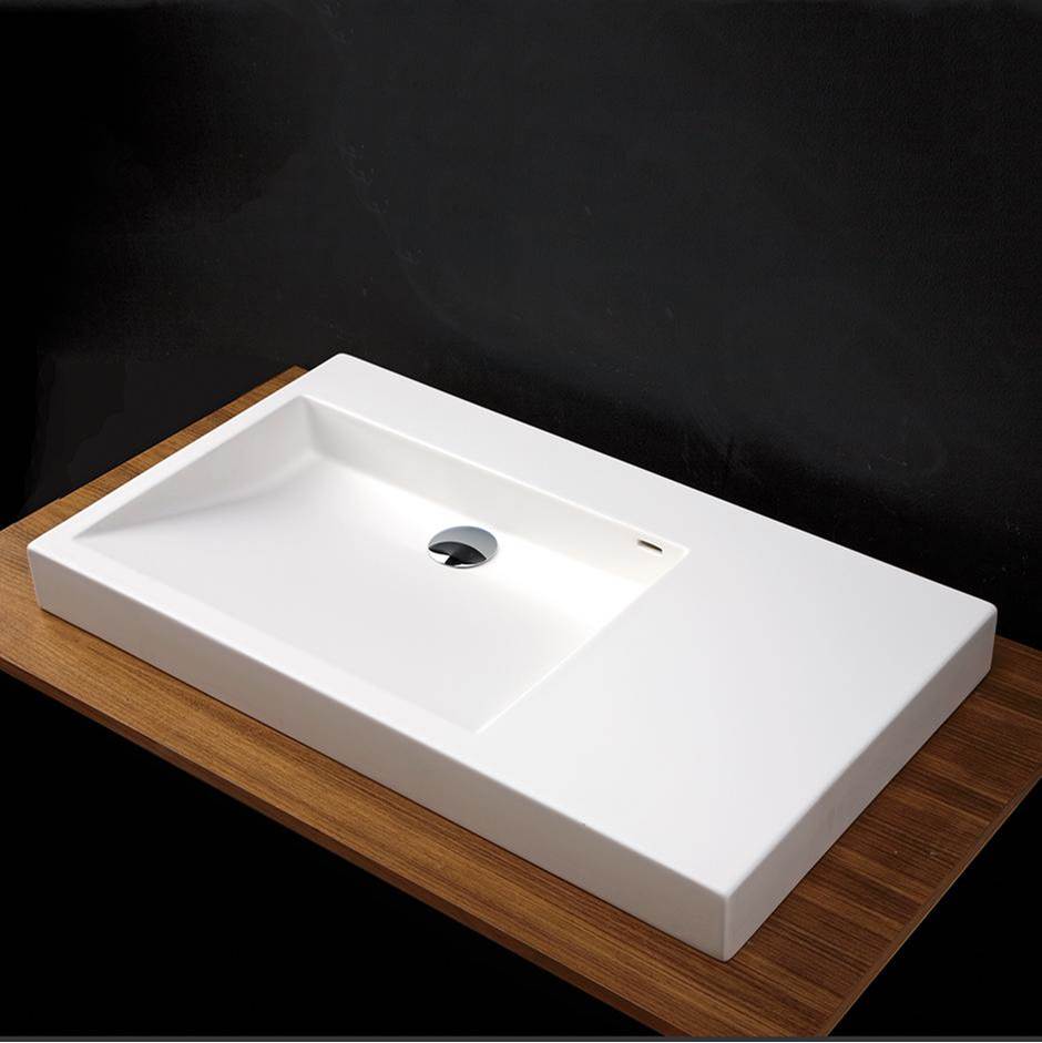 Lacava Vanity top Bathroom Sink with shelf on the left, made of solid surface, with an overflow.